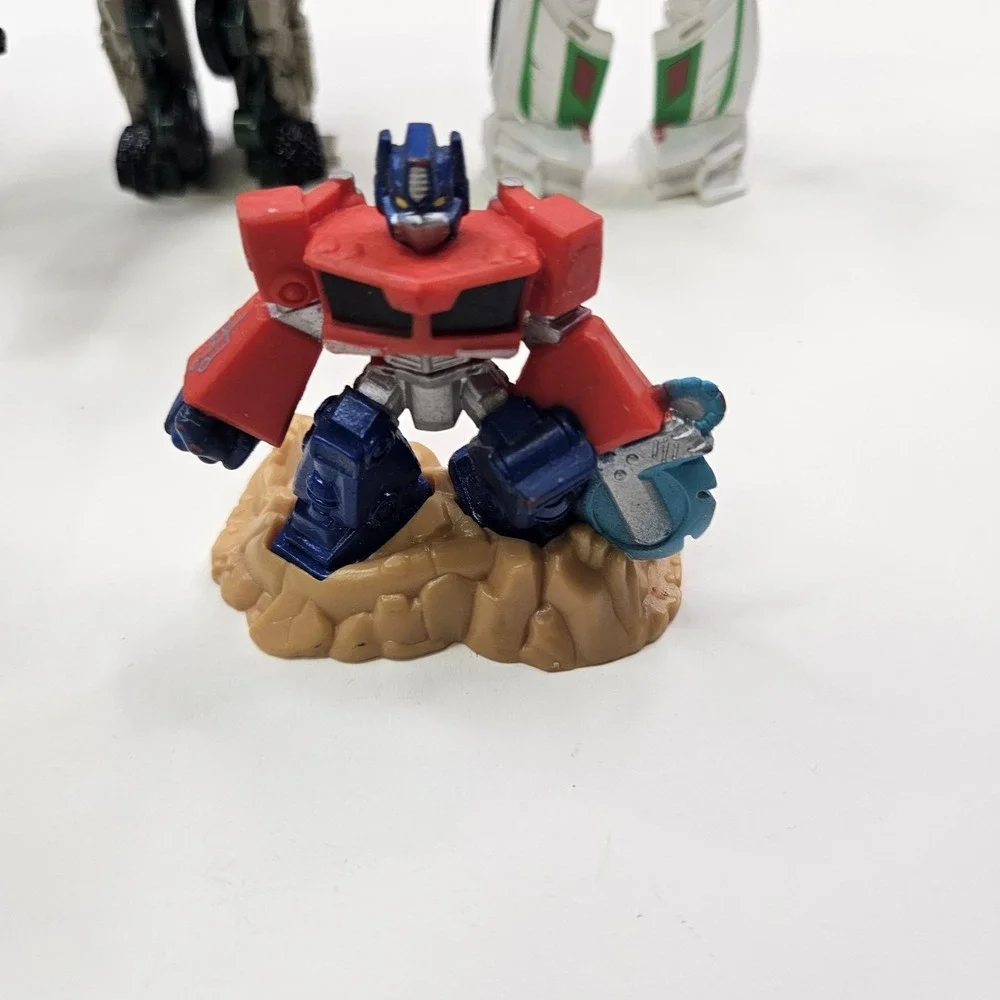 Lot of 5 Transformers Action Figures - Optimus Prime, Bumblebee & More